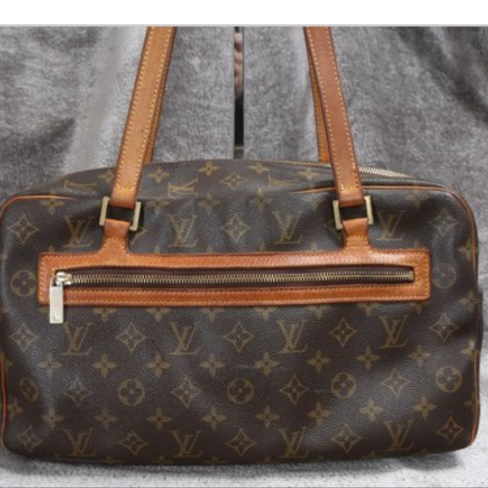 Louis Vuitton Paris Brown Monogram "Cite Gm" X-Large handbag